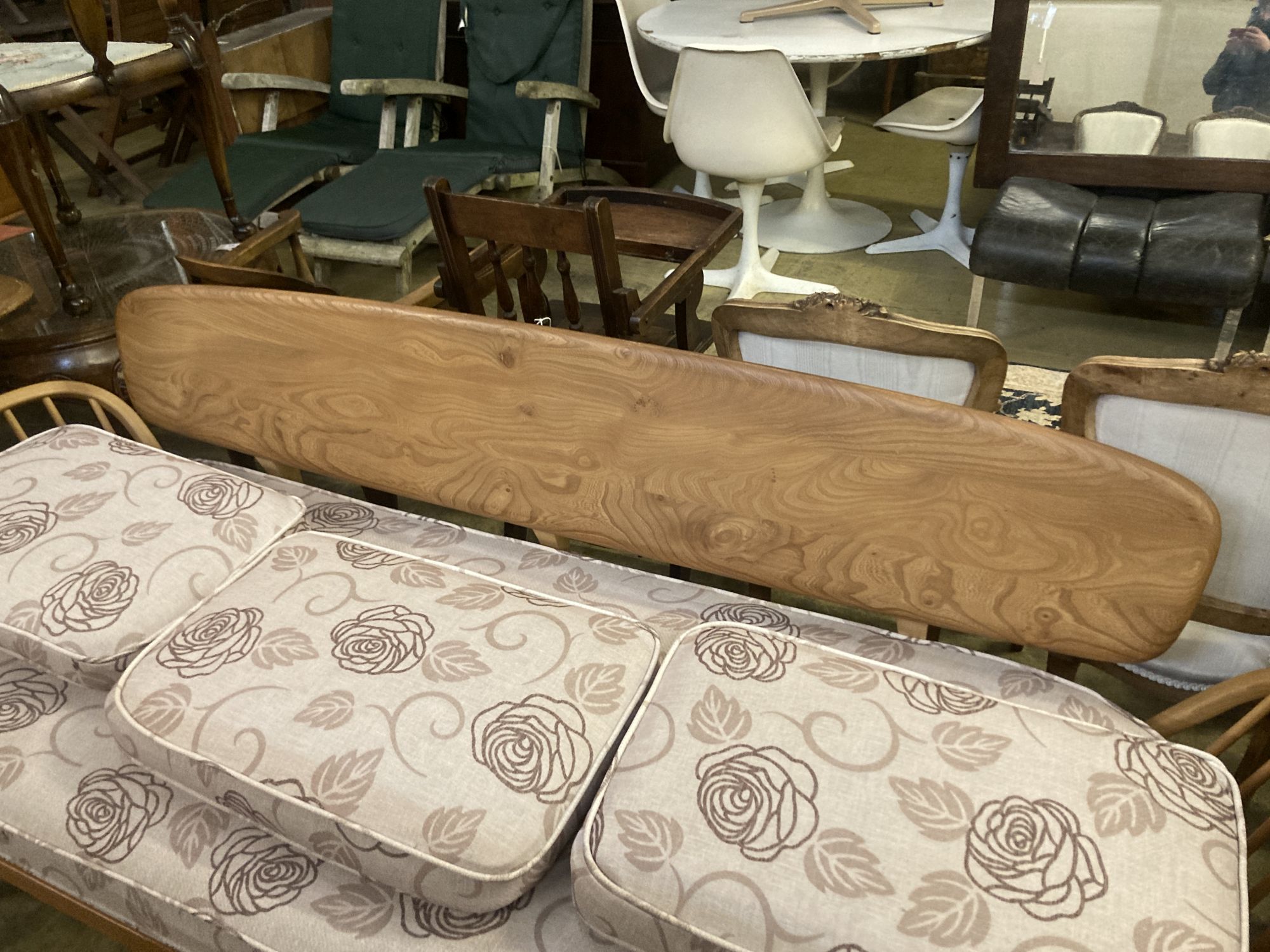 An Ercol beech three-seater Surfboard settee/daybed, width 208cm depth 76cm height 80cm